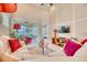 Bright and airy living room with access to a balcony overlooking a lake at 2001 Palm Key Ave, Oldsmar, FL 34677
