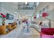 Open living room with high ceilings and a view to the kitchen at 2001 Palm Key Ave, Oldsmar, FL 34677