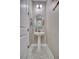 Elegant powder room with pedestal sink and modern fixtures at 2001 Palm Key Ave, Oldsmar, FL 34677
