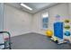 Bright workout room, natural light, rubber flooring and exercise equipment promote fitness at 2001 Palm Key Ave, Oldsmar, FL 34677