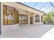 Open-air patio featuring large windows, ceiling fans, and views of the surrounding scenery at 7925 Royal Queensland Way, Lakewood Ranch, FL 34202