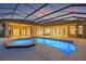 Relaxing pool and spa with a screened enclosure, offering an ideal space for outdoor recreation at 7925 Royal Queensland Way, Lakewood Ranch, FL 34202