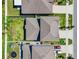 Two story house with gray roof and landscaped backyard at 12941 Wildflower Meadow Dr, Riverview, FL 33579