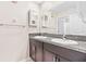 Bathroom with double vanity and granite countertops at 12941 Wildflower Meadow Dr, Riverview, FL 33579