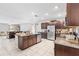 Spacious kitchen with stainless steel appliances and granite countertops at 12941 Wildflower Meadow Dr, Riverview, FL 33579