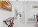 Bright entryway with tile floors, console table, and view to living area at 12941 Wildflower Meadow Dr, Riverview, FL 33579