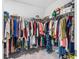Large walk-in closet with ample hanging and shelving space at 12941 Wildflower Meadow Dr, Riverview, FL 33579