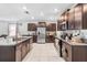 Modern kitchen featuring stainless steel appliances and granite countertops at 12941 Wildflower Meadow Dr, Riverview, FL 33579
