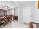 Formal dining room with dark wood furniture and chandelier at 12941 Wildflower Meadow Dr, Riverview, FL 33579