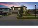 Two-story home with gray exterior and attached garage at 12941 Wildflower Meadow Dr, Riverview, FL 33579