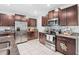 Well-equipped kitchen, granite countertops, stainless steel appliances at 12941 Wildflower Meadow Dr, Riverview, FL 33579