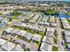 Wide aerial view of community, highlighting property location at 10617 Sandalwood N Ct, Pinellas Park, FL 33782