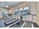Community fitness center with treadmills, ellipticals, and rowing machine at 2001 Palm Key Ave, Oldsmar, FL 34677