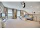 Spacious loft area with comfortable seating and a large TV at 2001 Palm Key Ave, Oldsmar, FL 34677