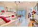 Living room with access to a screened porch and water views at 2001 Palm Key Ave, Oldsmar, FL 34677