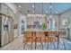 Bright kitchen with expansive island and stainless steel appliances at 2001 Palm Key Ave, Oldsmar, FL 34677
