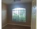 Bright office with large window and hardwood floor at 11445 Bathgate Ct, New Port Richey, FL 34654