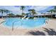Relax by the large freeform pool and waterslide at 5521 Limelight Dr, Apollo Beach, FL 33572