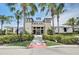 Community center with palm trees and ample parking at 5521 Limelight Dr, Apollo Beach, FL 33572