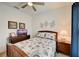 Cozy bedroom with a double bed, dresser, and nightstand at 5521 Limelight Dr, Apollo Beach, FL 33572