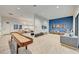 Community game room with shuffleboard and seating at 5521 Limelight Dr, Apollo Beach, FL 33572