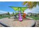 Colorful playground with slides and shade structure at 5521 Limelight Dr, Apollo Beach, FL 33572