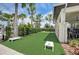 Enjoy a game of cornhole on the community lawn at 5521 Limelight Dr, Apollo Beach, FL 33572