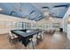 Bright meeting room with tables and chairs at 5521 Limelight Dr, Apollo Beach, FL 33572