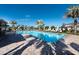 Inviting community pool area with plenty of seating at 10348 Blue Plume Ct, Riverview, FL 33578