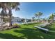 Pool deck with multiple lounge chairs for relaxing at 10348 Blue Plume Ct, Riverview, FL 33578