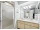 Bathroom with shower, vanity, and a mirror at 12049 Hoosier Ct # 202, Hudson, FL 34667