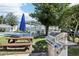 Enjoy outdoor cooking and shuffleboard fun at 12049 Hoosier Ct # 202, Hudson, FL 34667