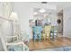 Kitchen with breakfast bar and colorful seating for casual dining at 12049 Hoosier Ct # 202, Hudson, FL 34667