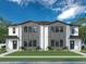 Modern two-unit building with gray and white exterior at 2709 W North B St # 2, Tampa, FL 33609