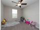Charming bedroom with ceiling fan at 10348 Blue Plume Ct, Riverview, FL 33578