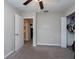 Bedroom with door to bathroom and closet at 10348 Blue Plume Ct, Riverview, FL 33578