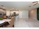 Open concept kitchen with island, stainless steel appliances, and dining area at 10348 Blue Plume Ct, Riverview, FL 33578