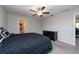 Spacious bedroom with ceiling fan and walk-in closet at 10348 Blue Plume Ct, Riverview, FL 33578