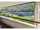 Balcony view of the community parking and green space at 36750 Us Highway 19 # 21212, Palm Harbor, FL 34684