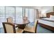 Small dining area with a round table and four chairs at 36750 Us Highway 19 # 21212, Palm Harbor, FL 34684