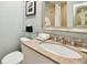Bathroom with granite countertop, single sink, and shower/tub combo at 36750 Us Highway 19 # 21212, Palm Harbor, FL 34684