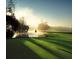 Peaceful golf course with a scenic sunrise at 36750 Us Highway 19 # 21212, Palm Harbor, FL 34684