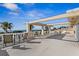 Shared balcony with multiple chairs and ocean views at 1200 N Shore Ne Dr # 414, St Petersburg, FL 33701