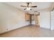 Empty bedroom featuring tile floors and a ceiling fan at 36750 Us Highway 19 N # 19106, Palm Harbor, FL 34684