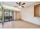 Spacious bedroom with tile floors and built-in wooden closet at 36750 Us Highway 19 N # 19106, Palm Harbor, FL 34684