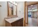 Bathroom with granite vanity and a mirror at 36750 Us Highway 19 N # 19106, Palm Harbor, FL 34684