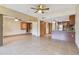 Open living room with kitchen and built-in shelving at 36750 Us Highway 19 N # 19106, Palm Harbor, FL 34684