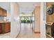 Clean entryway with view into living area and kitchen at 36750 Us Highway 19 N # 19106, Palm Harbor, FL 34684