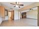 Open concept living room with kitchen and bathroom access at 36750 Us Highway 19 N # 19106, Palm Harbor, FL 34684