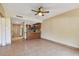Open concept living room and kitchen area at 36750 Us Highway 19 N # 19106, Palm Harbor, FL 34684